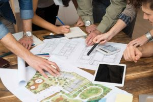 Kitchen design and floor plans being reviewed